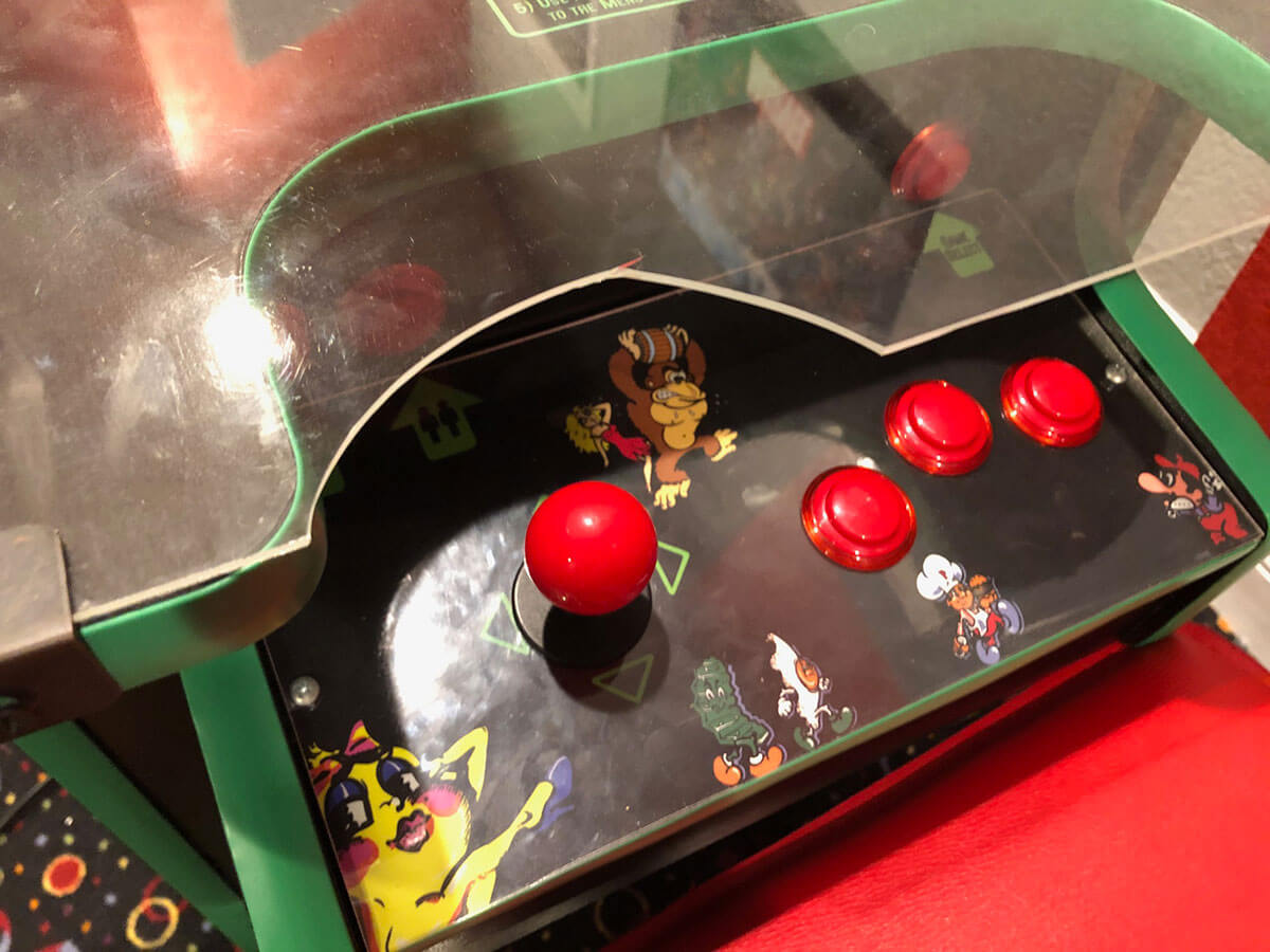 Before: damaged arcade game panel