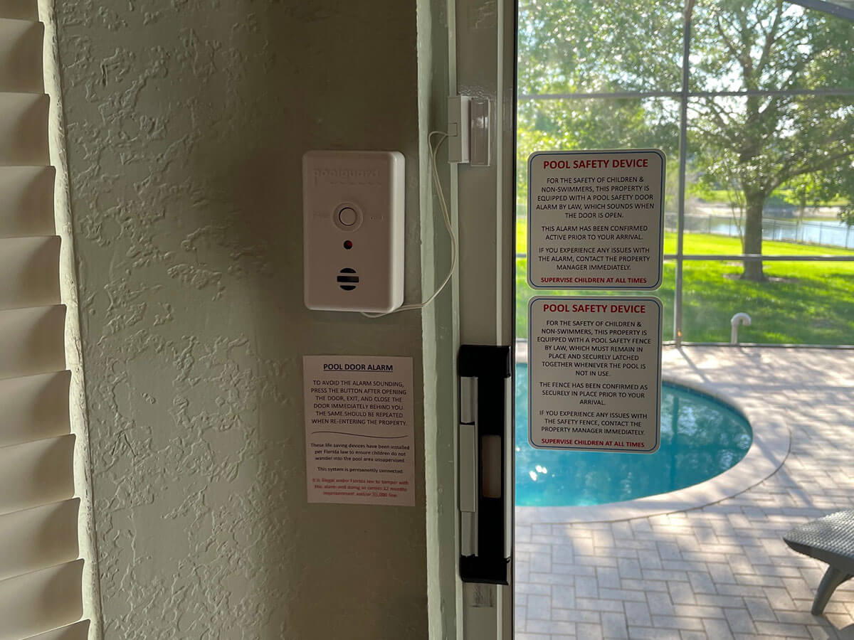 Pool door alarm installed, Florida compliant
