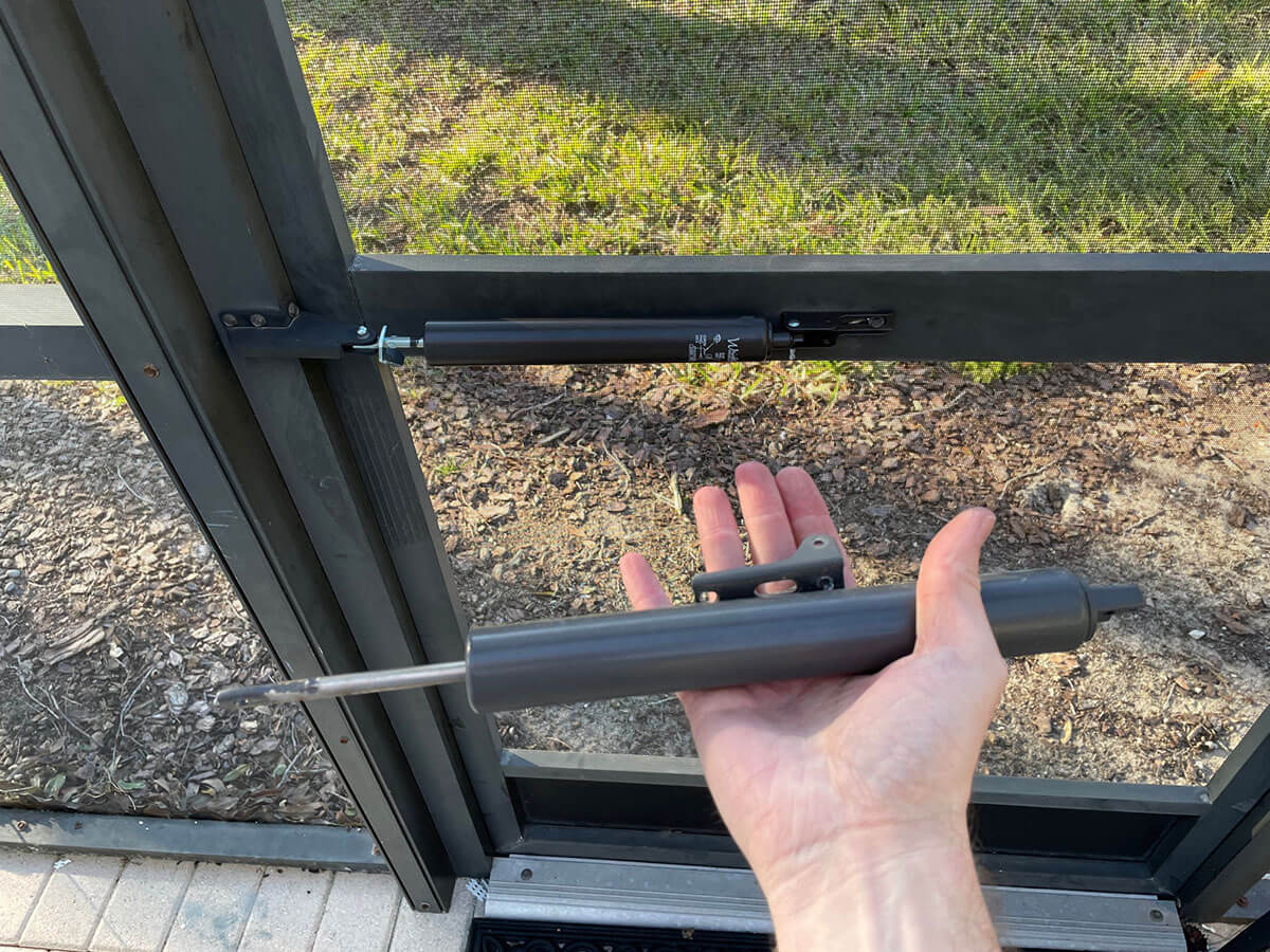 Screen door closer installed and adjusted